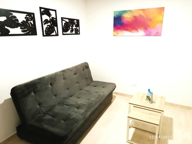 Imagen de la habitación del Hotel Quedate Apartahotel San Gil Plaza. Foto 6