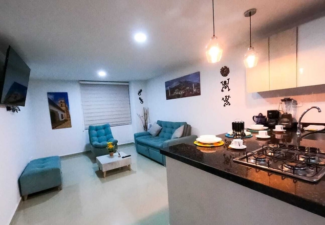 Imagen de la habitación del Hotel Quedate Apartahotel San Gil Plaza. Foto 10