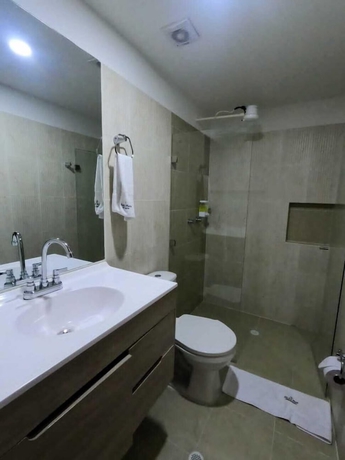 Imagen de la habitación del Hotel Quedate Apartahotel San Gil Plaza. Foto 13