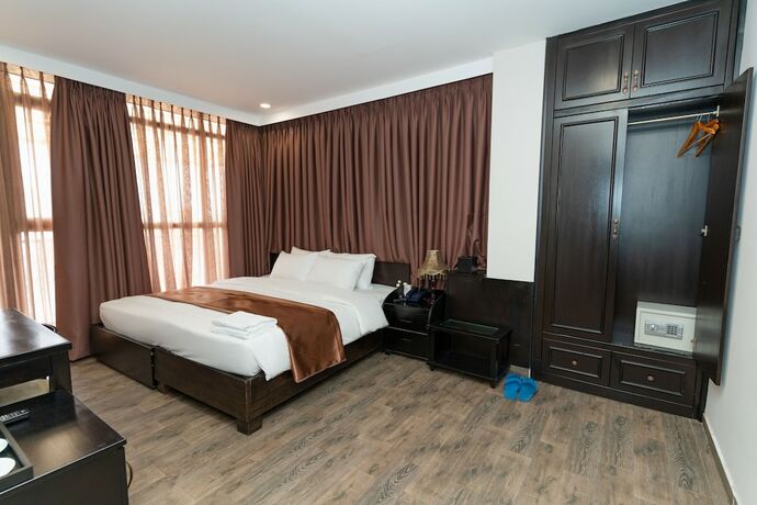 Imagen de la habitación del Hotel Queen Central. Foto 13