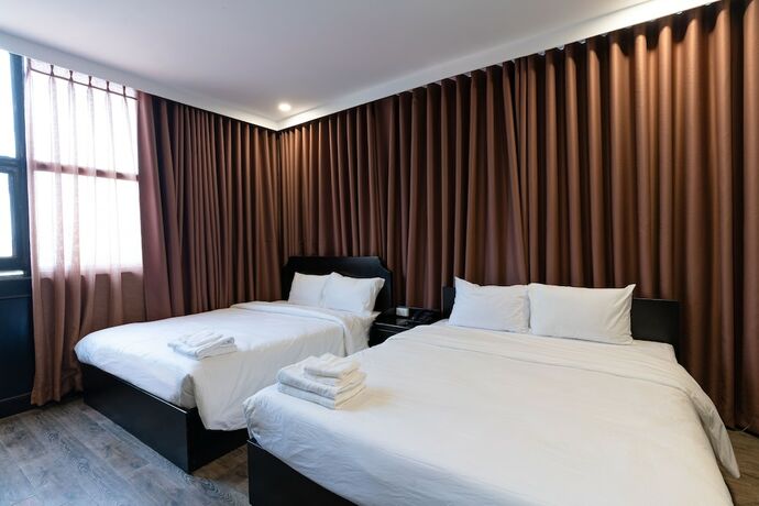 Imagen de la habitación del Hotel Queen Central. Foto 16