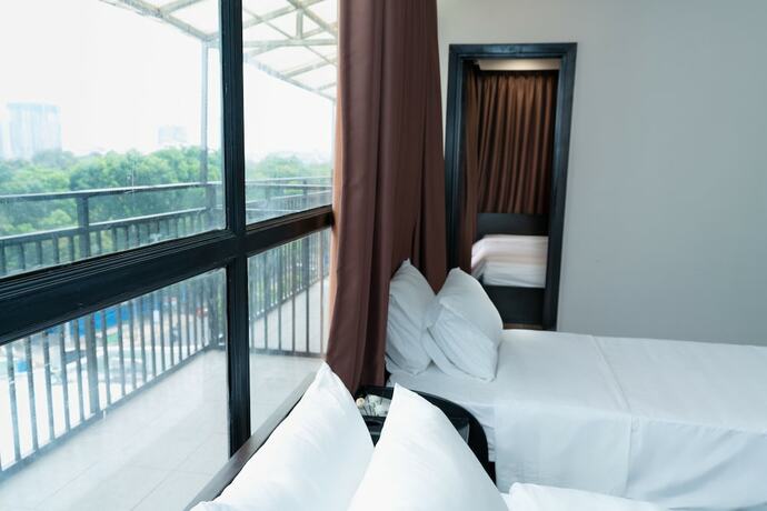 Imagen de la habitación del Hotel Queen Central. Foto 18