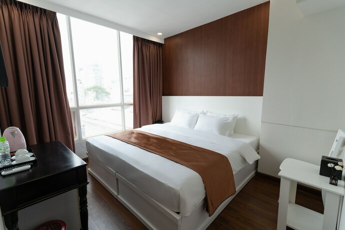 Imagen de la habitación del Hotel Queen Central. Foto 24