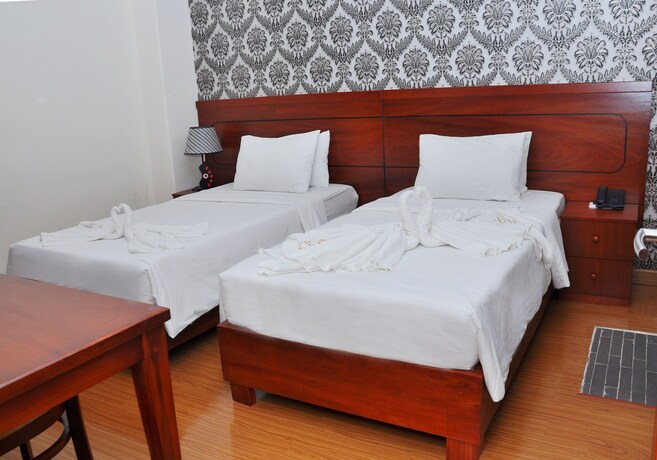 Imagen de la habitación del Hotel Queen Central. Foto 28