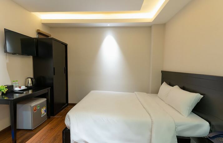 Imagen de la habitación del Hotel Queen Central. Foto 32