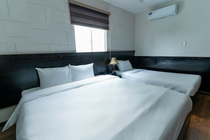 Imagen de la habitación del Hotel Queen Central. Foto 34
