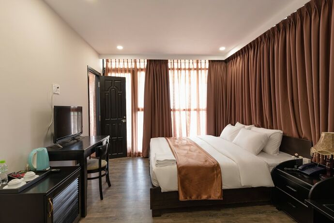 Imagen de la habitación del Hotel Queen Central. Foto 35