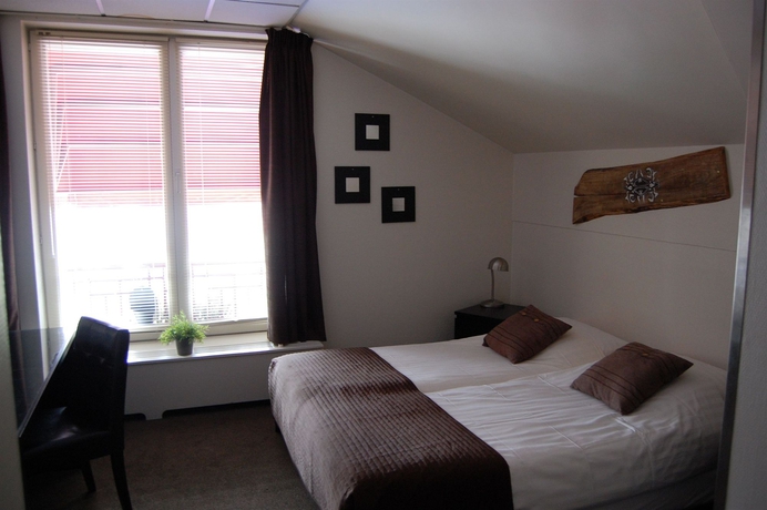 Imagen de la habitación del Hotel Queen, Eindhoven. Foto 11