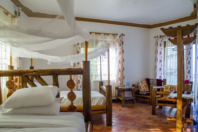 Imagen de la habitación del Hotel Queen Elizabeth Park View Tourist Lodge. Foto 17
