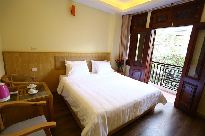 Imagen de la habitación del Hotel Queen Light. Foto 4