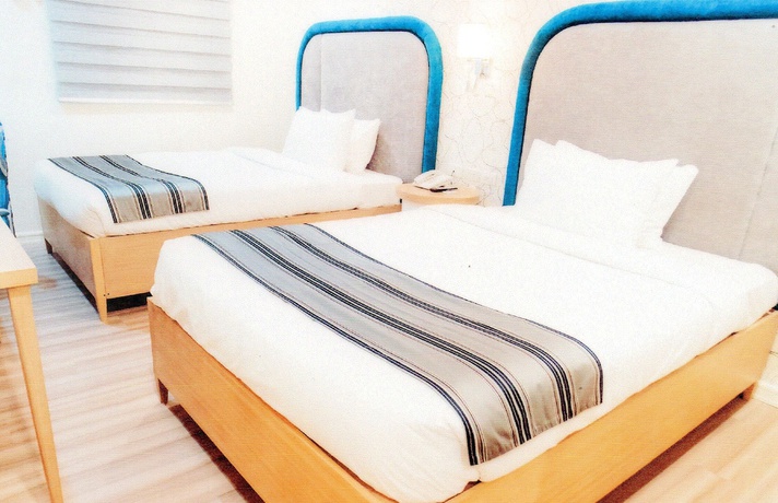 Imagen de la habitación del Hotel Queen Margarette Hotel - Downtown. Foto 5