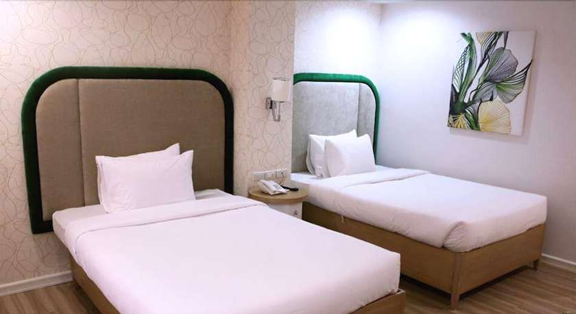 Imagen de la habitación del Hotel Queen Margarette Hotel - Downtown. Foto 7