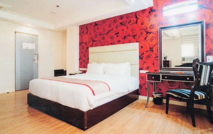 Imagen de la habitación del Hotel Queen Margarette Hotel - Downtown. Foto 8