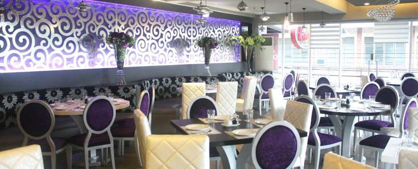 Imagen del bar/restaurante del Hotel Queen Margarette Hotel - Downtown. Foto 3