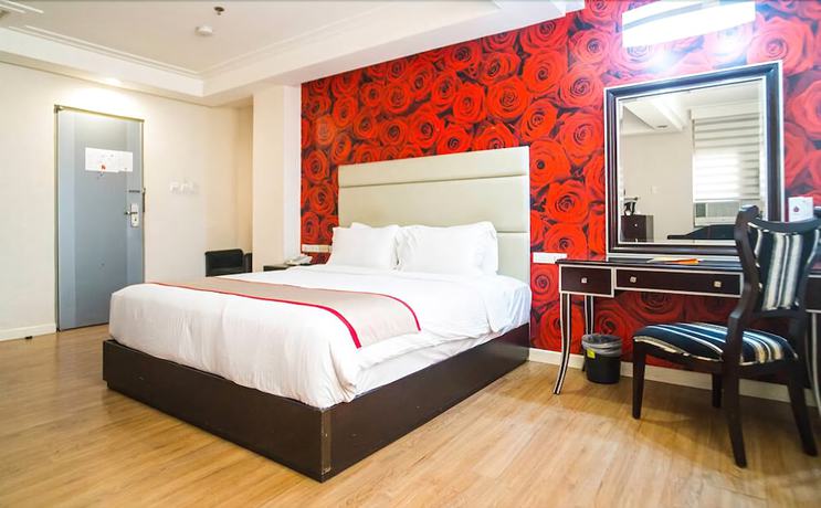 Imagen de la habitación del Hotel Queen Margarette Hotel - Downtown. Foto 10