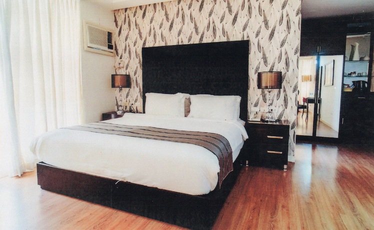 Imagen de la habitación del Hotel Queen Margarette Hotel - Downtown. Foto 13