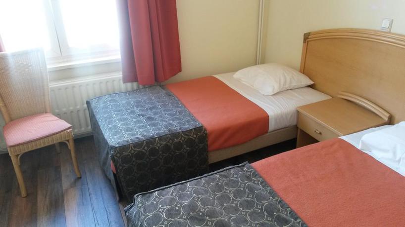 Imagen de la habitación del Hotel Queen Mary, Bruselas. Foto 6