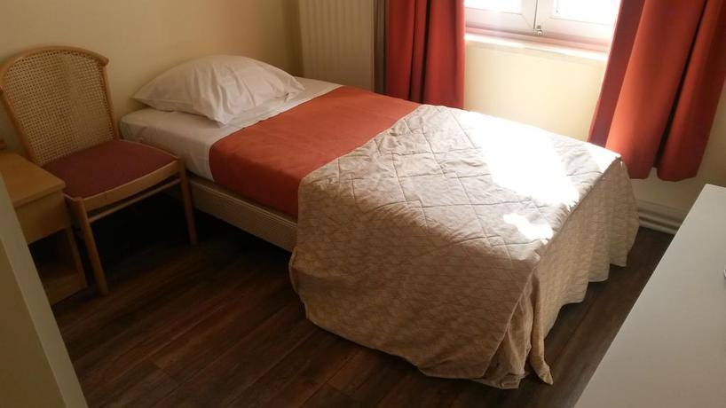 Imagen de la habitación del Hotel Queen Mary, Bruselas. Foto 7