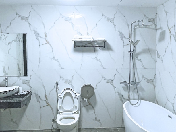 Imagen de la habitación del Hotel Queen - Mo Lao. Foto 13
