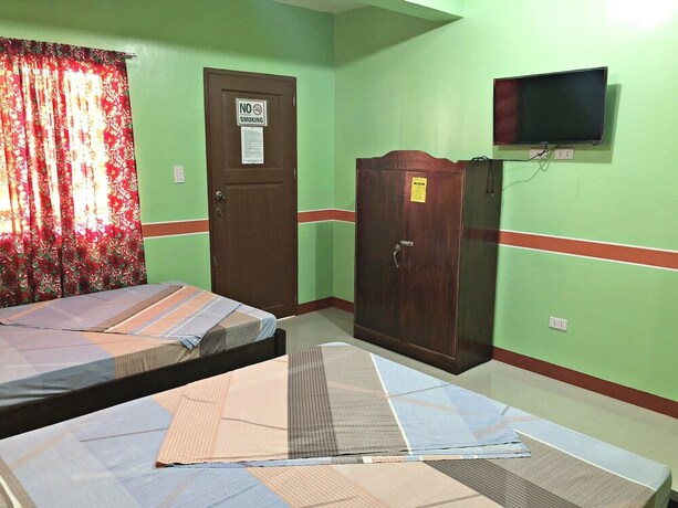 Imagen de la habitación del Hotel Queen Of Isle Restaurant And Cottages. Foto 19