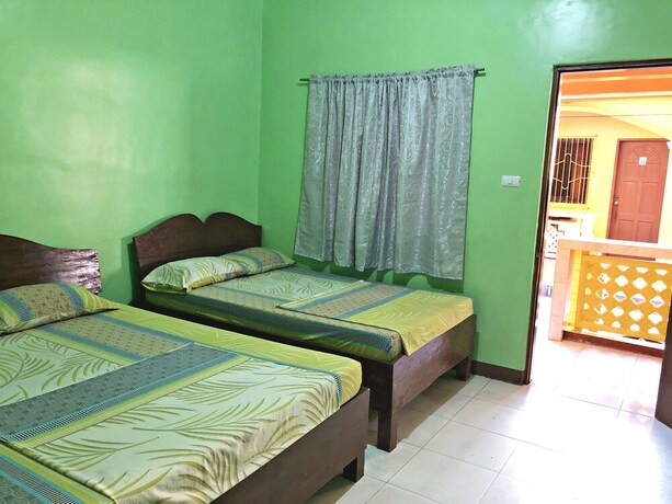 Imagen de la habitación del Hotel Queen Of Isle Restaurant And Cottages. Foto 23
