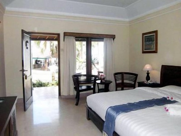 Imagen de la habitación del Hotel Queen Of The South Resort. Foto 8