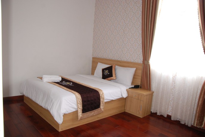 Imagen de la habitación del Hotel Queen Villa 2. Foto 3