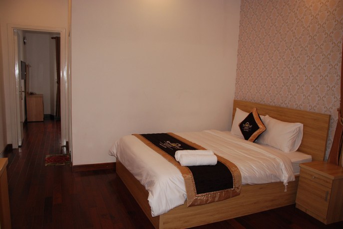 Imagen de la habitación del Hotel Queen Villa 2. Foto 7
