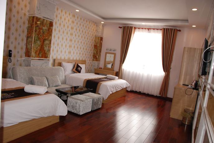 Imagen de la habitación del Hotel Queen Villa 2. Foto 11