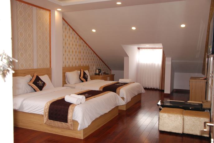 Imagen de la habitación del Hotel Queen Villa 2. Foto 13