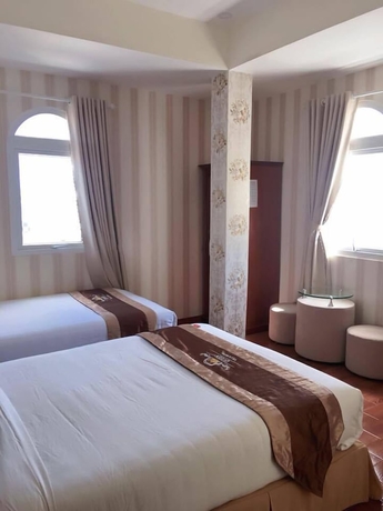 Imagen de la habitación del Hotel Queen Villa. Foto 5