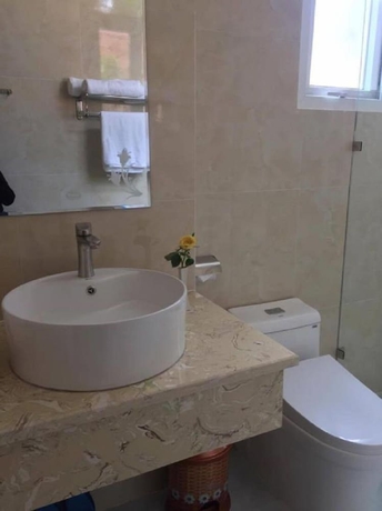 Imagen de la habitación del Hotel Queen Villa. Foto 14