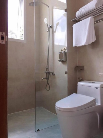Imagen de la habitación del Hotel Queen Villa. Foto 15