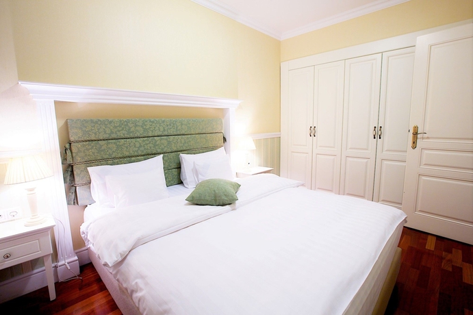 Imagen de la habitación del Hotel Queen´s Court & Residence. Foto 2