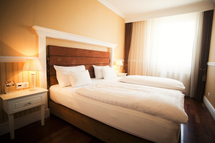 Imagen de la habitación del Hotel Queen´s Court & Residence. Foto 6