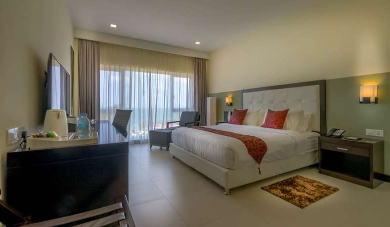 Imagen de la habitación del Hotel Queenco and Casino. Foto 7