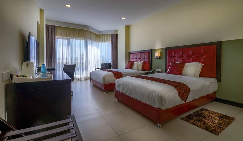 Imagen de la habitación del Hotel Queenco and Casino. Foto 9