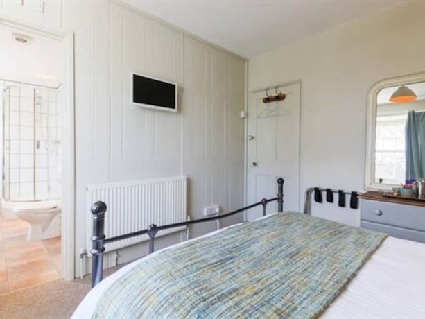 Imagen de la habitación del Hotel Queens Arms. Foto 15