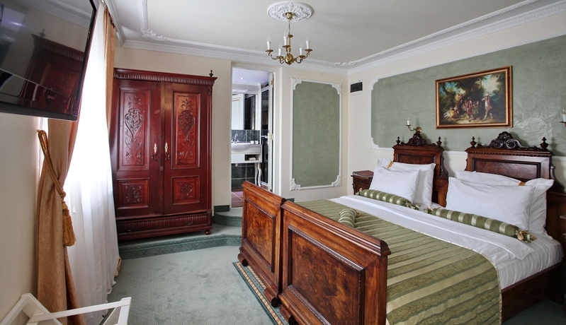 Imagen de la habitación del Hotel Queens Astoria Design. Foto 8