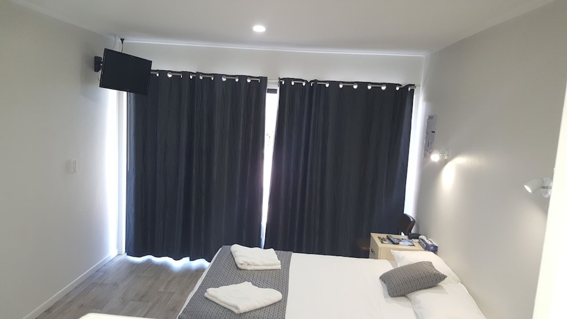 Imagen de la habitación del Hotel Queens Beach Motor. Foto 10