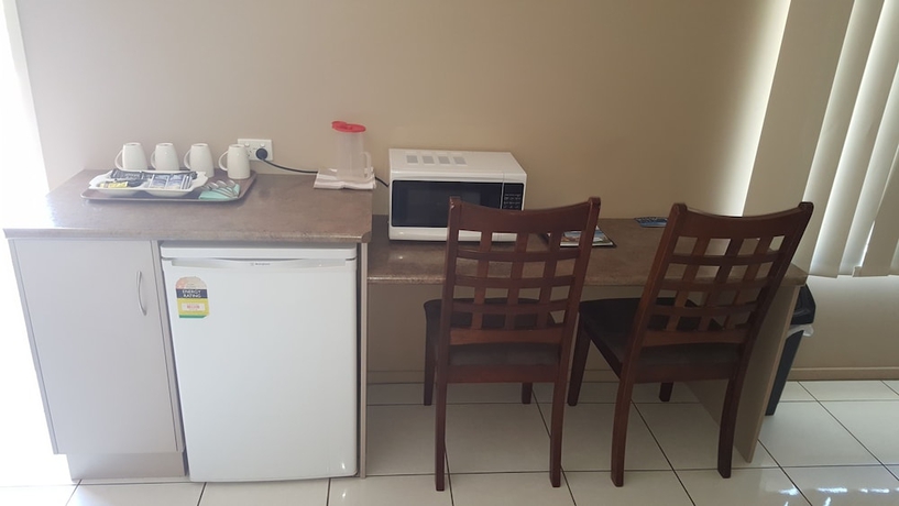 Imagen de la habitación del Hotel Queens Beach Motor. Foto 14