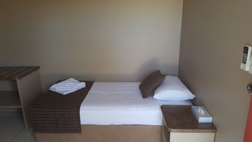 Imagen de la habitación del Hotel Queens Beach Motor. Foto 16