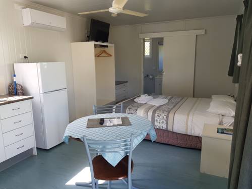 Imagen de la habitación del Hotel Queens Beach Tourist Village. Foto 5