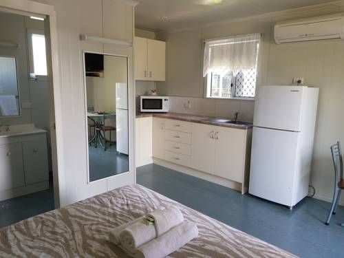 Imagen de la habitación del Hotel Queens Beach Tourist Village. Foto 6