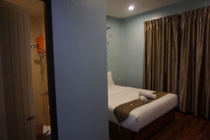 Imagen de la habitación del Hotel Queens, Chum Phae. Foto 18