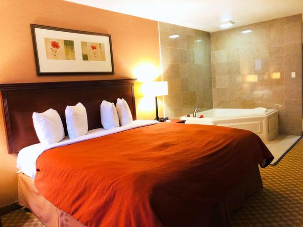 Imagen de la habitación del Hotel Queens County Inn and Suites. Foto 6