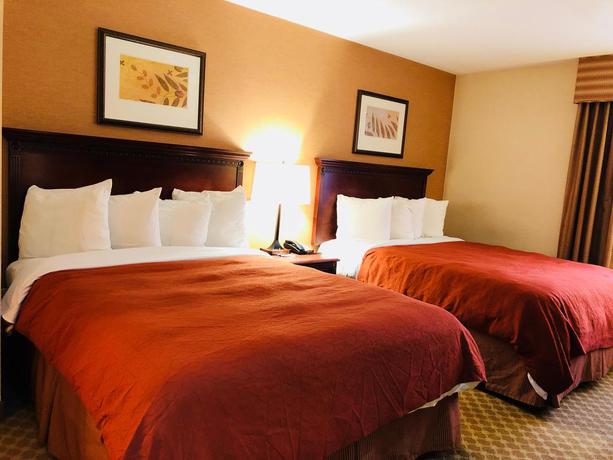 Imagen de la habitación del Hotel Queens County Inn and Suites. Foto 7