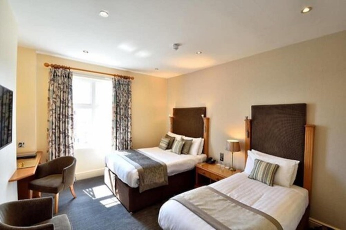 Imagen de la habitación del Hotel Queens Court. Foto 2