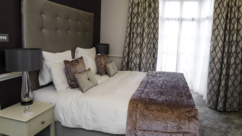 Imagen de la habitación del Hotel Queens Court. Foto 6
