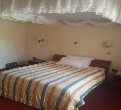 Imagen de la habitación del Hotel Queens Garden. Foto 10